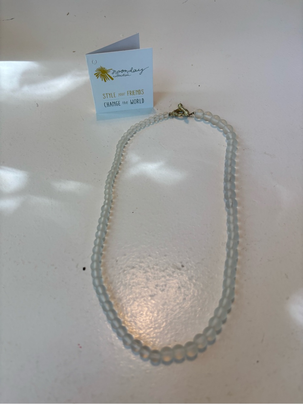 Noonday Collection Frosted White Bead Necklace with Gold Clasp